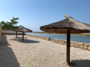 Villa en Bord de Lagune et Mer à Mbodiene